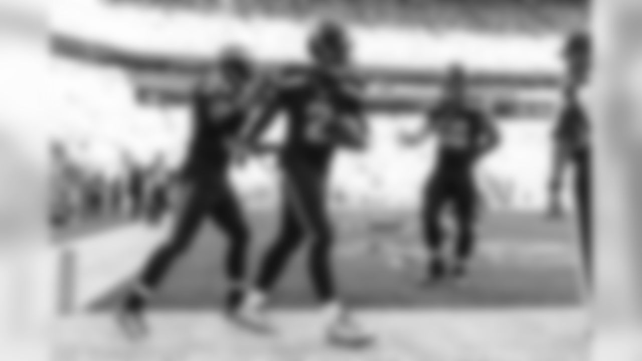 Quarterback Trevone Boykin keeps the ball after completing his first touchdown pass in the pros, a 16-yard pass to Doug Baldwin gave the Seahawks a commanding 37-3 lead in the fourth quarter.