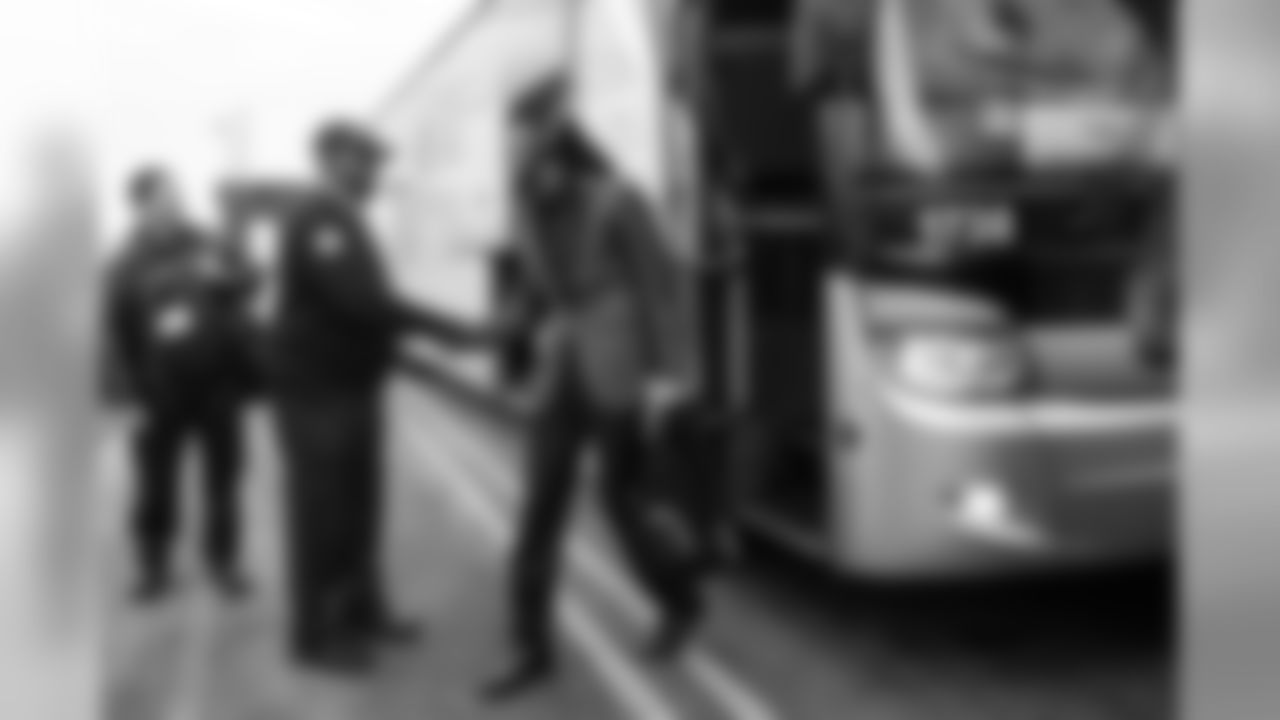 Upon arrival at MetLife Stadium, Richard Sherman takes a moment to shake hands with and thank their bus driver for the week's work.