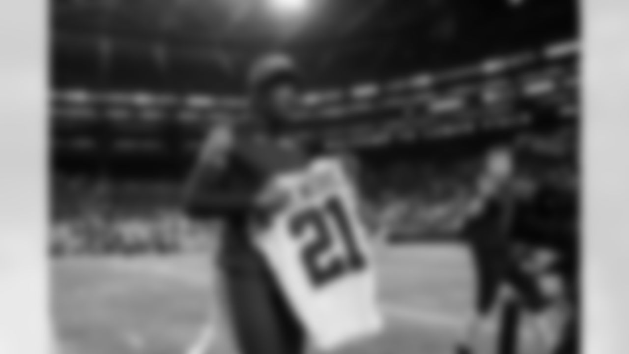 Seahawks cornerback Riq Woolen (27) walks off the field with the jersey of Cowboys cornerback Stephon Gilmore after a preseason game at Lumen Field in Seattle, Wash. on August 19, 2023.