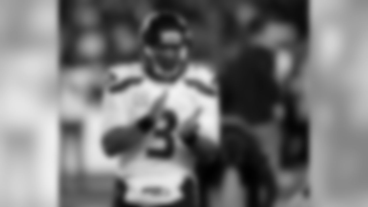 Seattle Seahawks quarterback Russell Wilson warms up before an NFL football game against the New England Patriots, Sunday, Nov. 13, 2016, in Foxborough, Mass. (AP Photo/Charles Krupa)