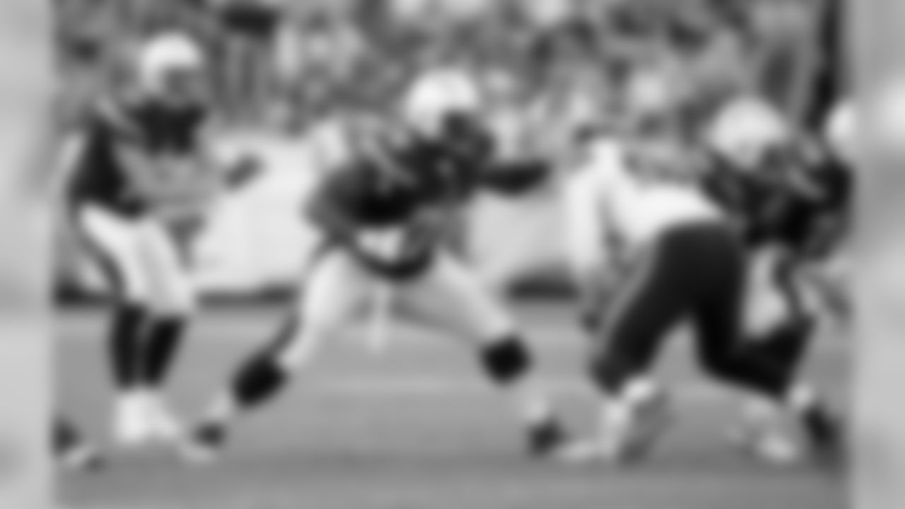 San Diego Chargers tackle D.J. Fluker (76) blocks during the 2015 NFL preseason football game against the Seattle Seahawks on Saturday, Aug. 29, 2015 in San Diego. The Seahawks won the game 16-15. (Paul Spinelli via AP)