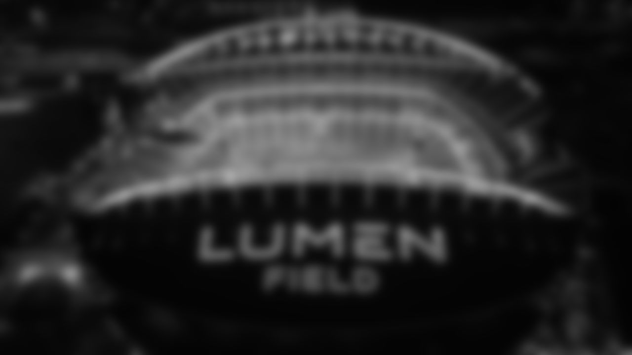 Lumen Field was lit in green on Sunday night in advance of Monday Night Football on September 12, 2022.