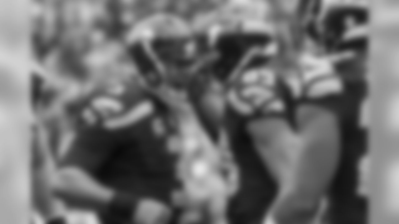 Quarterback Russell Wilson celebrates with receiver Doug Baldwin after they connected on the first of three passing touchdowns on the afternoon.