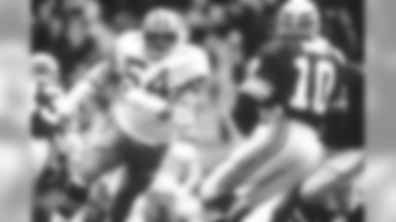 Pro Football Hall of Fame and Dallas Cowboys defensive tackle Randy White (54) coming in for the sack on Seattle Seahawks quarterback Jim Zorn (10) in the Cowboys 31-14 loss to the Seahawks at the Thanksgiving Day Game on 11/27/1986 at Texas Stadium in Irvine, Texas. (AP Photo / Al Messerschmidt)