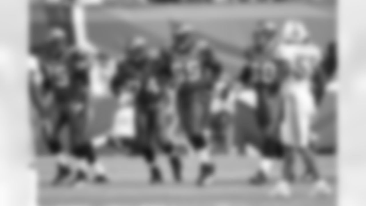 The Offensive Line breaks the huddle.