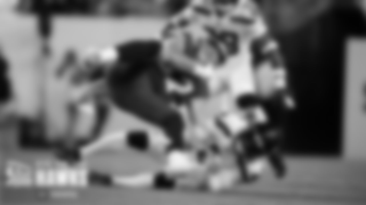Seattle cornerback D.J. Reed makes a tackle in the first half.