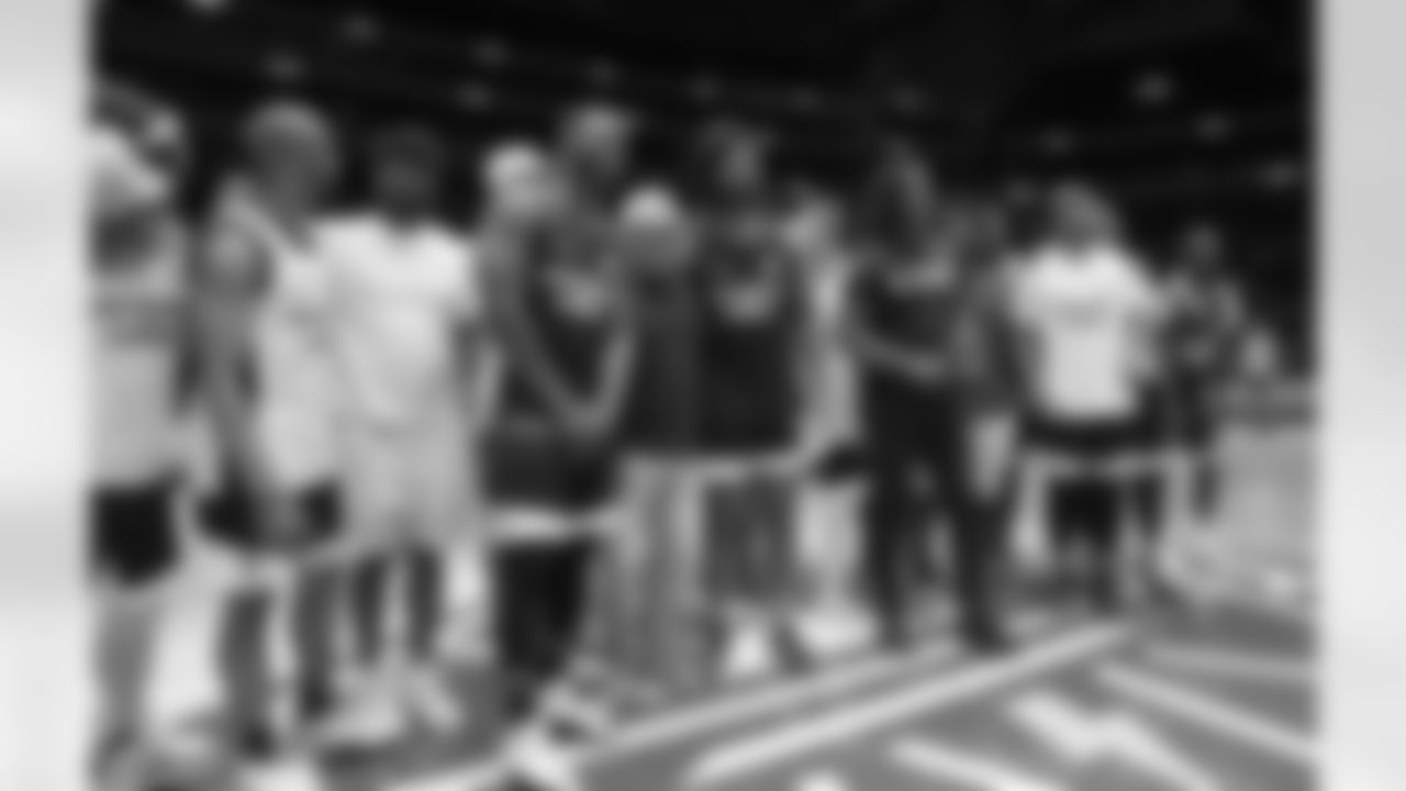 Seattle celebrities, including several members of the Seahawks 2013 Super Bowl team, play in a Champions of Change basketball game at the Climate Pledge Arena on June 26, 2022.