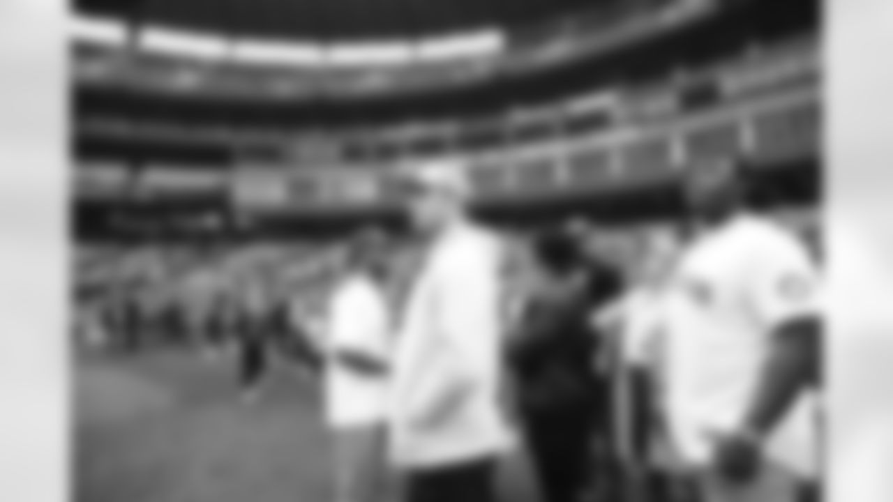 Seahawks first round pick Charles Cross throws out the ceremonial first pitch for the Seattle Mariners at T-Mobile Park on May 29, 2022.