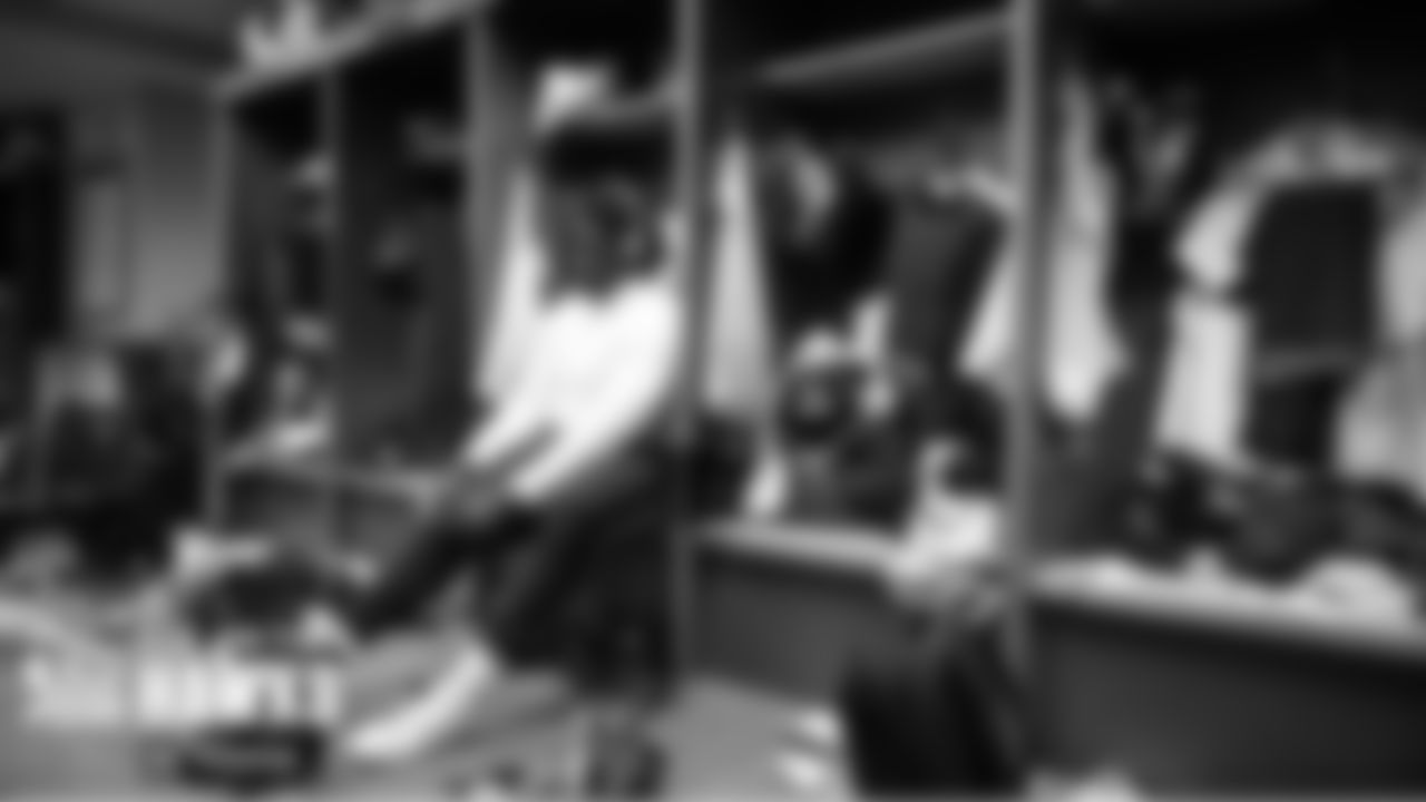 Seahawks offensive tackle Germain Ifedi gets dressed in the visitors locker room prior to the game.