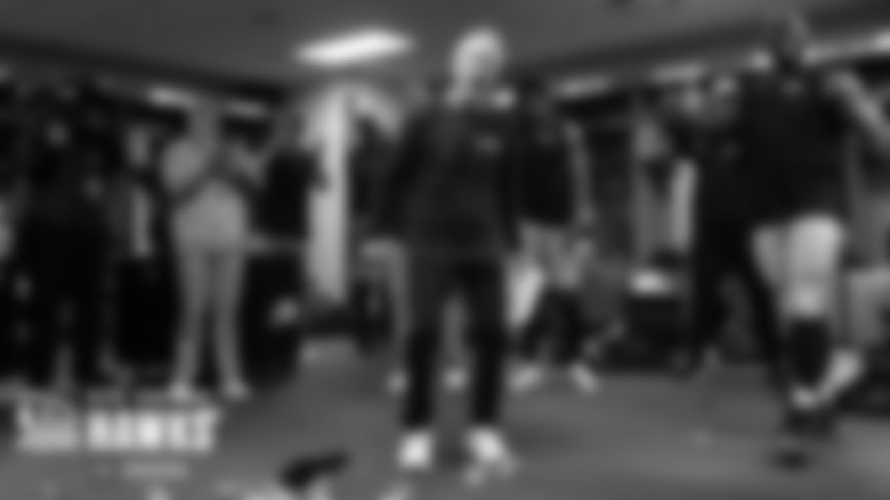 Seahawks head coach Pete Carroll is exuberant in the team's locker room after the victory.