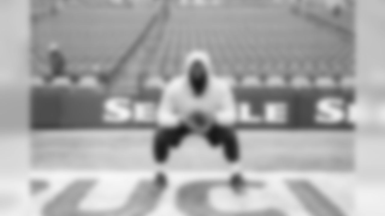 Defensive tackle Shamar Stephen is one of the first players on the field for early warmups.
