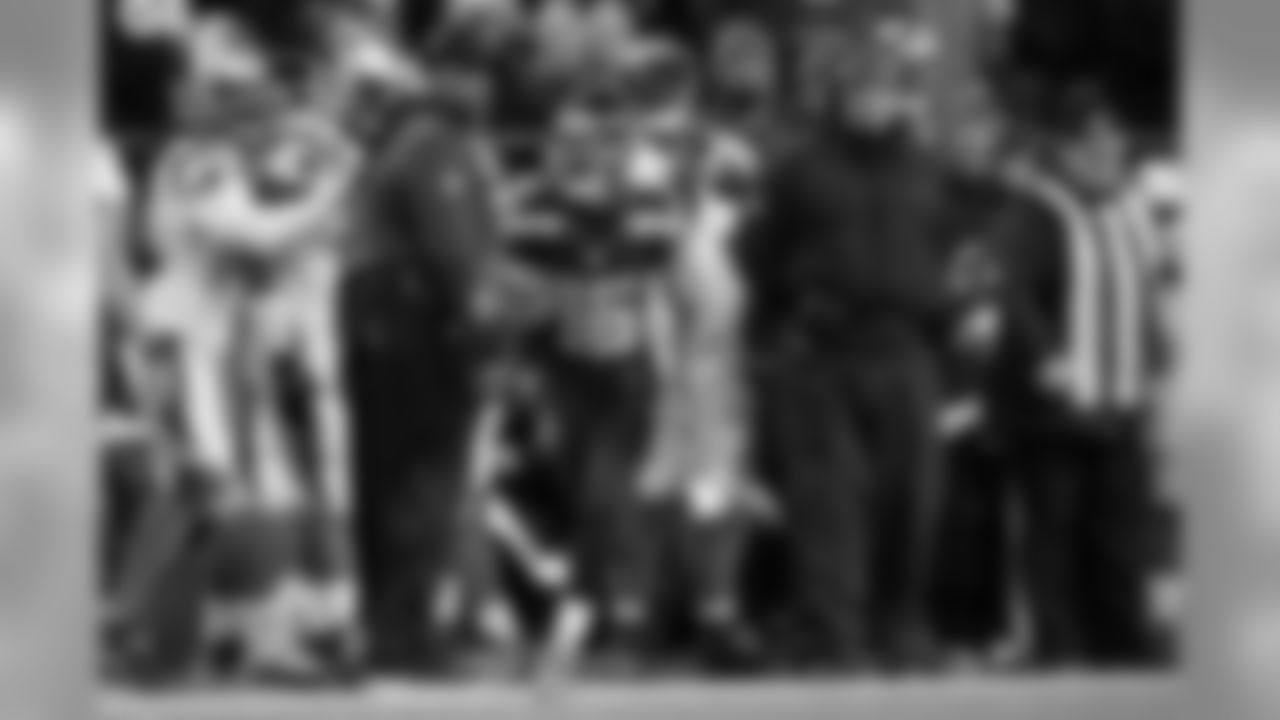 Seattle's Tyler Lockett takes a jet sweep up the right side past the Carolina sideline and their head coach Ron Rivera on his way to a 75-yard touchdown on the first play from scrimmage of the second half. The touchdown extended Seattle's lead to 30-7.