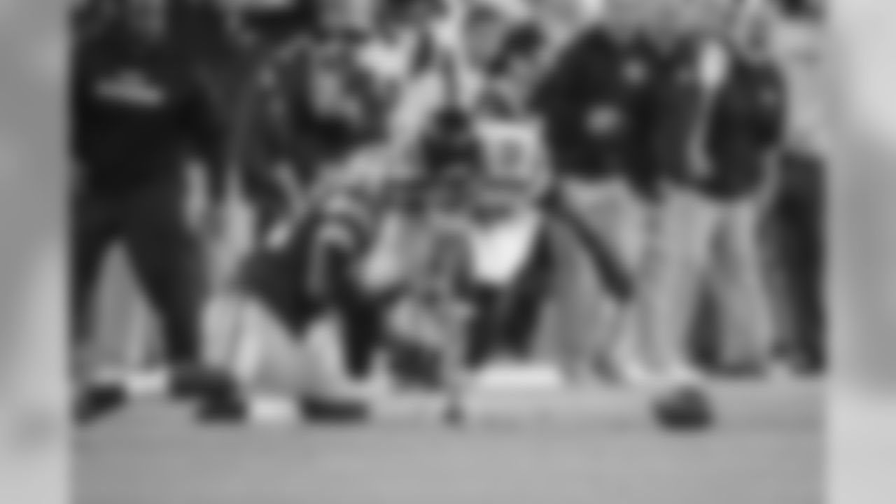 Seahawks linebacker K.J. Wright continued his fine play, stripping the ball out from Green Bay's James Starks and searching for the loose ball as the Seahawks bench erupts.
