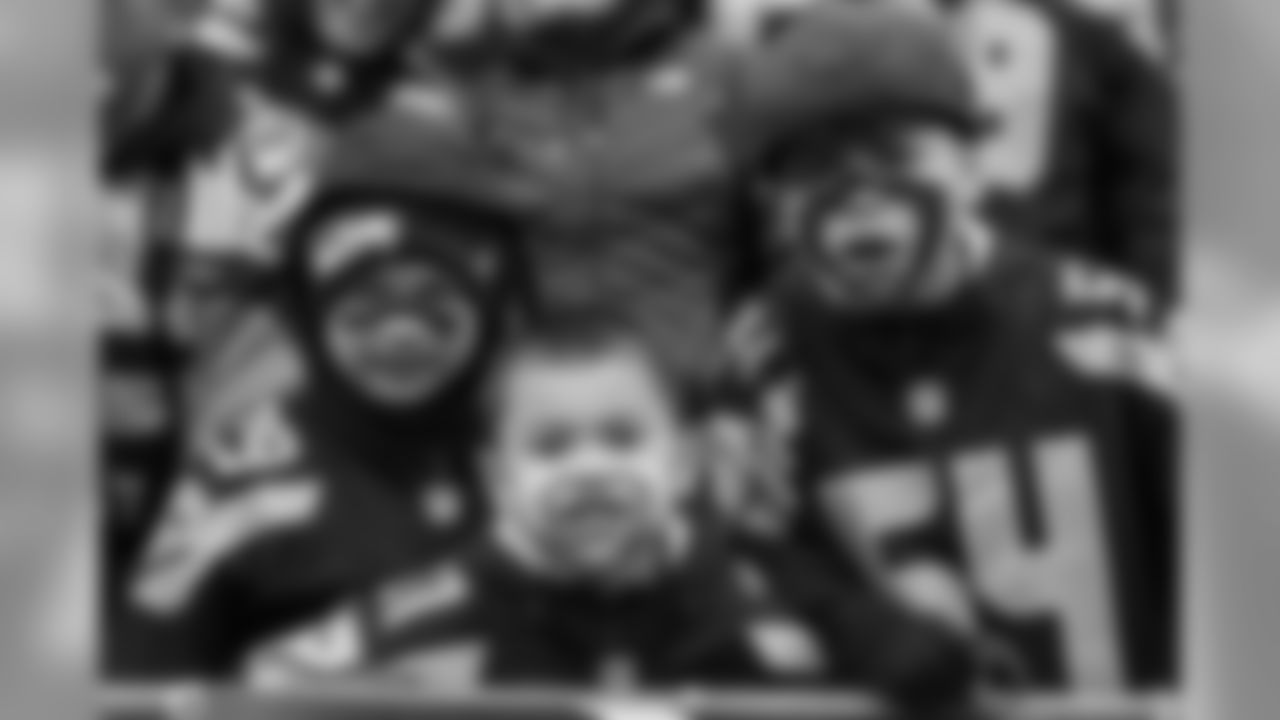 Three menacing young 12s had their game faces ready in the first row of the south end zone. The Bobby Wagner fan at right even is wearing his Ninja Turtles hat in honor of his favorite player.