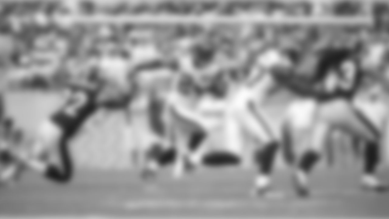 Seattle Seahawks running back Marshawn Lynch evades a tackle from Steelers linebacker James Harrison and takes off down the field during a game on September 18, 2011. The Steelers defeated the Seahawks 24-0