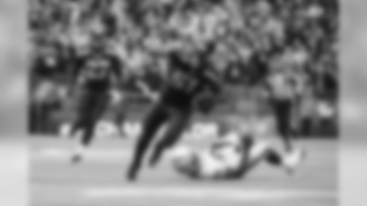 Seattle Seahawks defensive end Bruce Irvin takes back an interception for a touchdown during a game against the Raiders on November 4, 2014. The Seahawks defeated the Raiders 30-24.