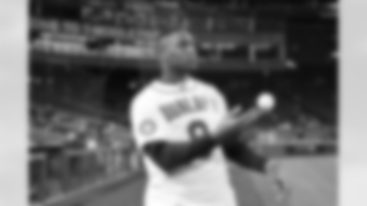 Carlos Dunlap II throws out the first pitch at the Mariners game on September 27, 2021.