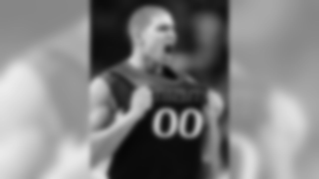Miami's Jimmy Graham pumps out his jersey after Miami upset Maryland, 67-62, during a first round game of the Men's Atlantic Coast Conference basketball tournament in Tampa, Fla., Thursday, March 8, 2007. (AP Photo/David J. Phillip)