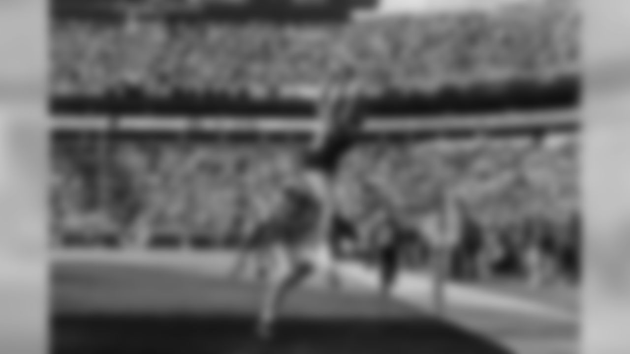 Seattle's Jermaine Kearse stretches high to catch a pass from Russell Wilson for the Seahawks first score of the game, cutting the lead to 31-7 after the extra point.