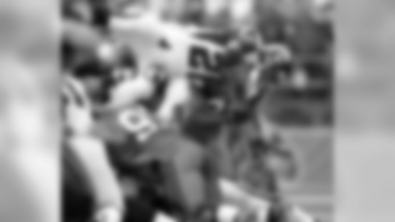 The Seattle Seahawks held Warrick Dunn to 54 yards in a 21-18 Seahawks victory in Seattle on Sunday, Sept. 18, 2005. (AP Photo/John Froschauer)