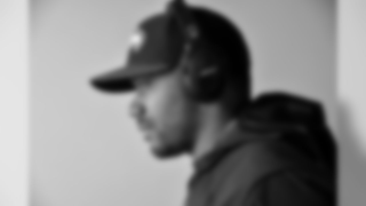 At the stadium, quarterback Russell Wilson made his way to from the locker room to the field for his early warmups wearing his custom Bose headphones.