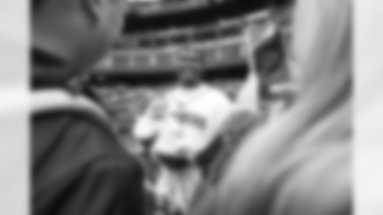 Seahawks first round pick Charles Cross throws out the ceremonial first pitch for the Seattle Mariners at T-Mobile Park on May 29, 2022.