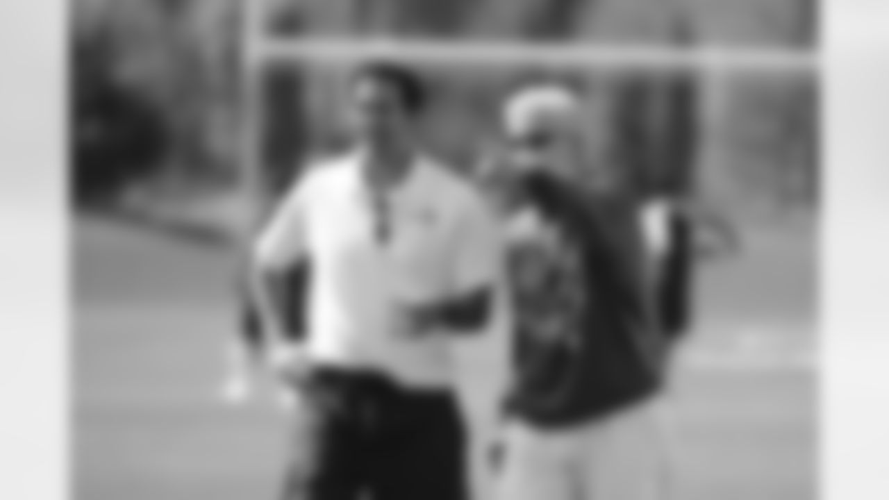 Miami Heat head coach Erik Spoelstra (left) and Seahawks head coach Pete Carroll (right)