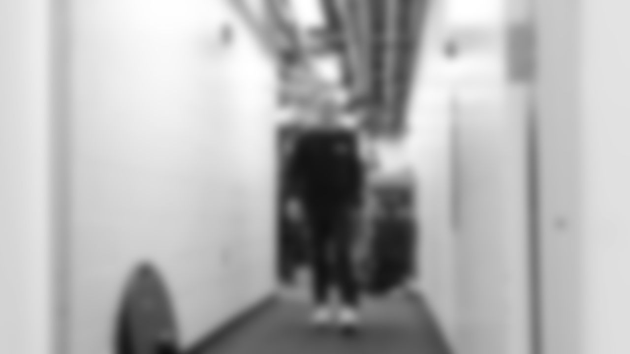 Head coach Pete Carroll through the locker room prior to kickoff.