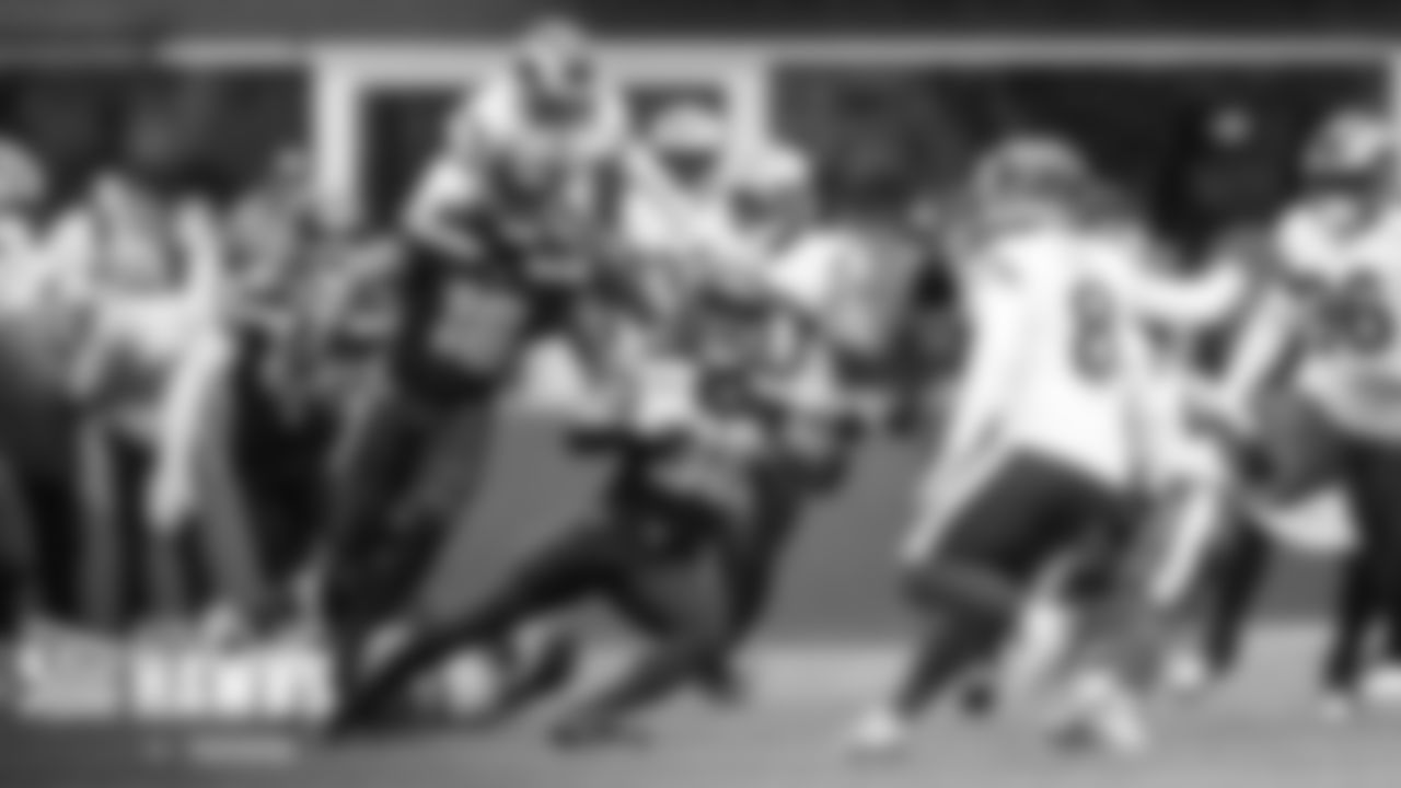 Seahawks returner Godwin Igwebuike gains yards on a kickoff return.