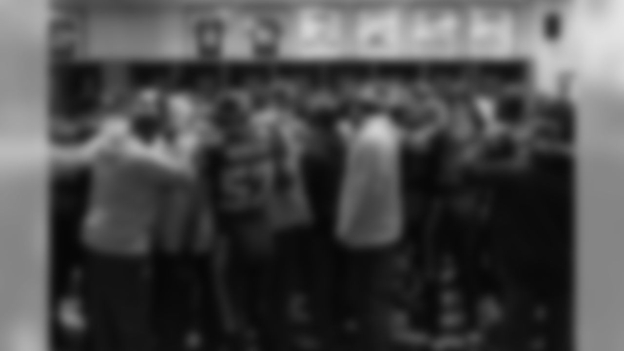 The Seahawks gathered in the locker room in front of banners from playoff games and Ring of Honor members before taking the field for the Sunday Night Football game against the Panthers.
