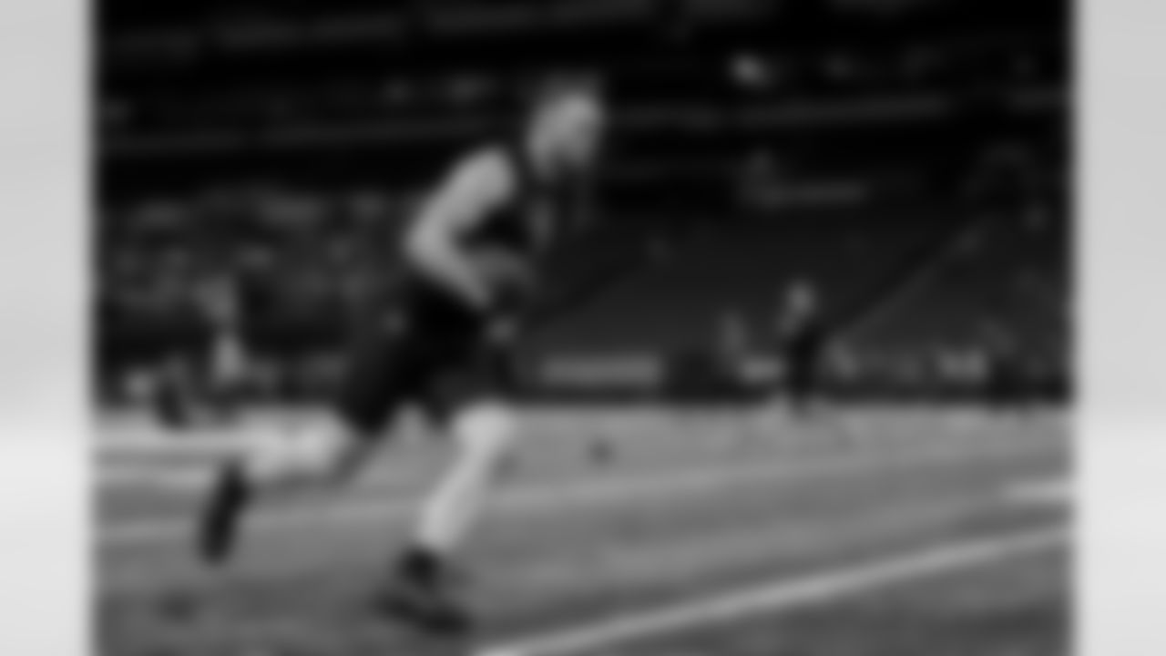 San Diego State tight end Daniel Bellinger (03) drives with the ball after making a catch during the 2022 Scouting Combine on Thursday, March 3, 2022 in Indianapolis, Indiana. (Ben Liebenberg/NFL)
