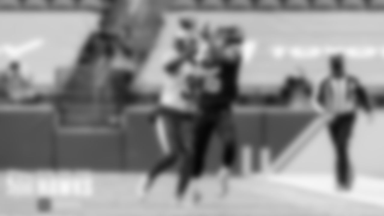 Seahawks receiver Tyler Lockett makes a one-handed catch for a long gain.