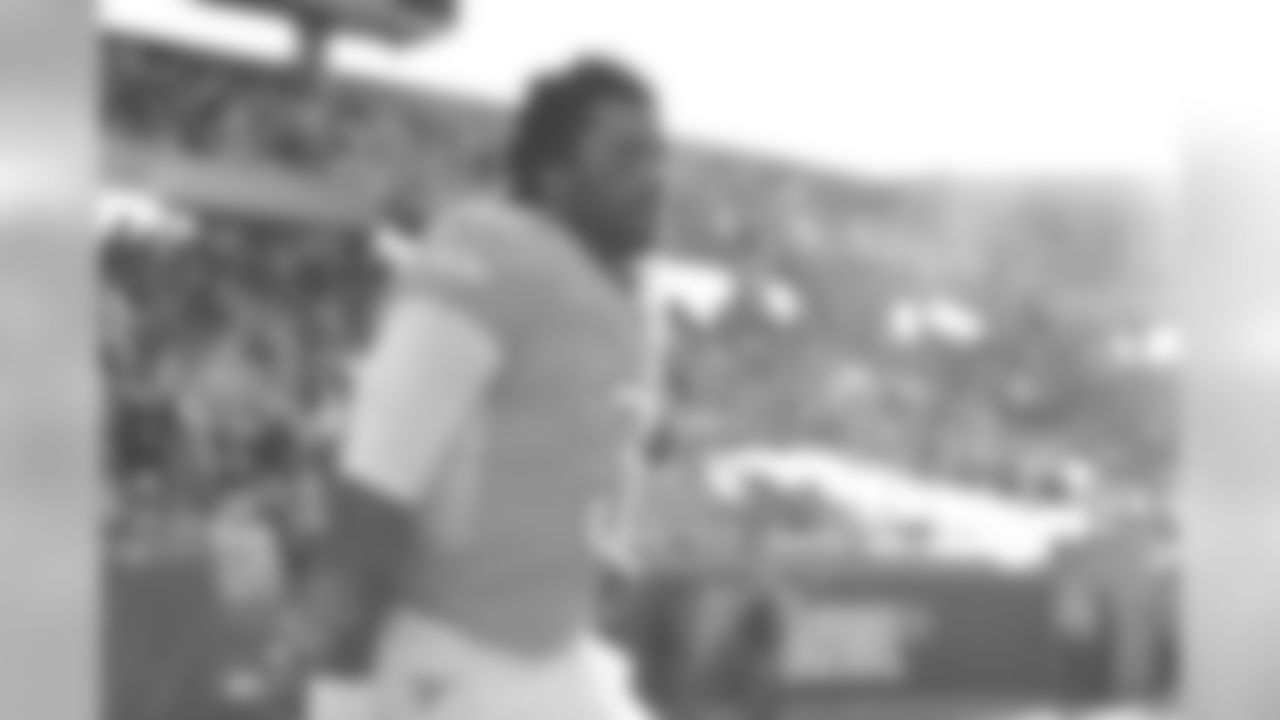 NFC quarterback Russell Wilson, of the Seattle Seahawks, walks out onto the field before the second half of the NFL Pro Bowl football game against the AFC, Sunday, Jan. 26, 2020, in Orlando, Fla. (AP Photo/Steve Luciano)