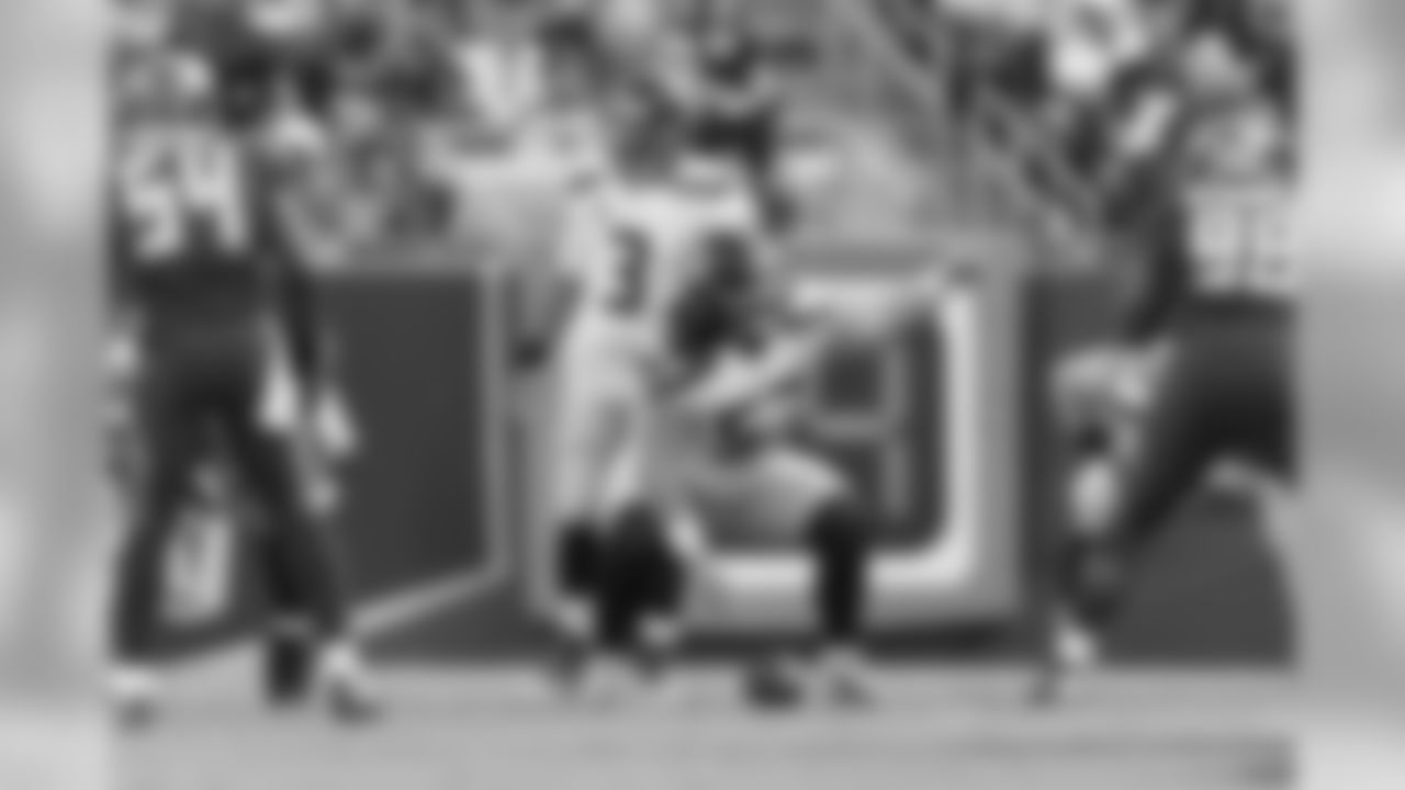 Rookie center Joey Hunt calls out protections during the first start of his N.F.L. career.