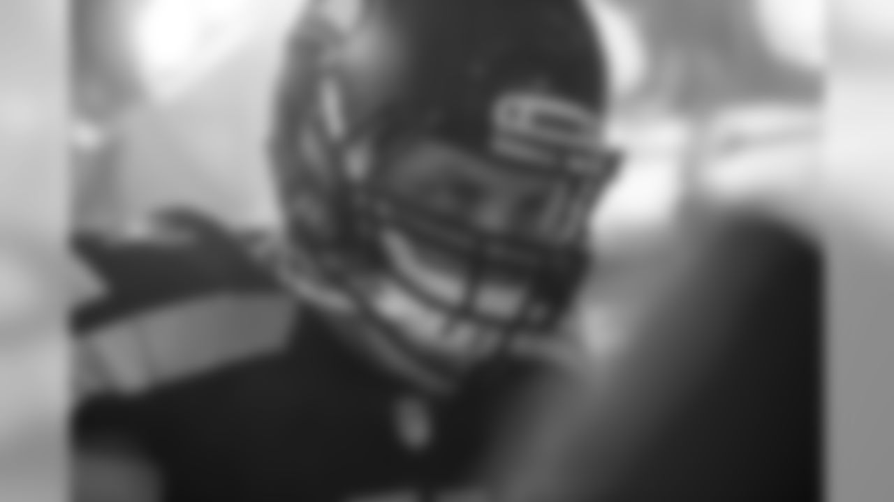 J.R. Sweezy is a study in focus as he gets ready to exit the pregame tunnel during introductions.
