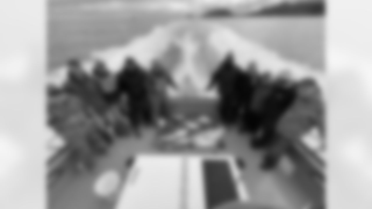 Dareke Young, Abraham Lucas, and Seahawks staff members went fishing in Seward, AK on July 09, 2023.
