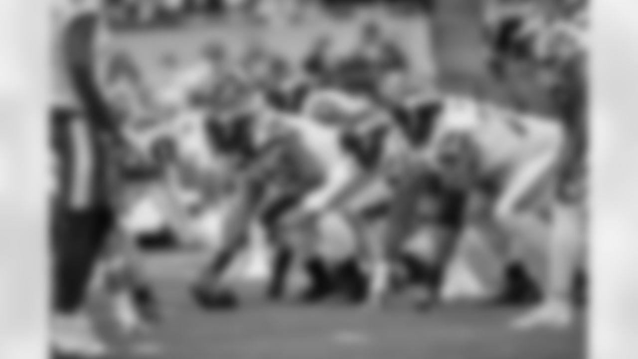 Seattle Seahawks offensive guard Kyle Fuller (61) holds his hand over the ball at the line of scrimmage during an NFL football game against the Los Angeles Rams on Thursday, October 7, 2021 in Seattle, Washington. (Alika Jenner/NFL)