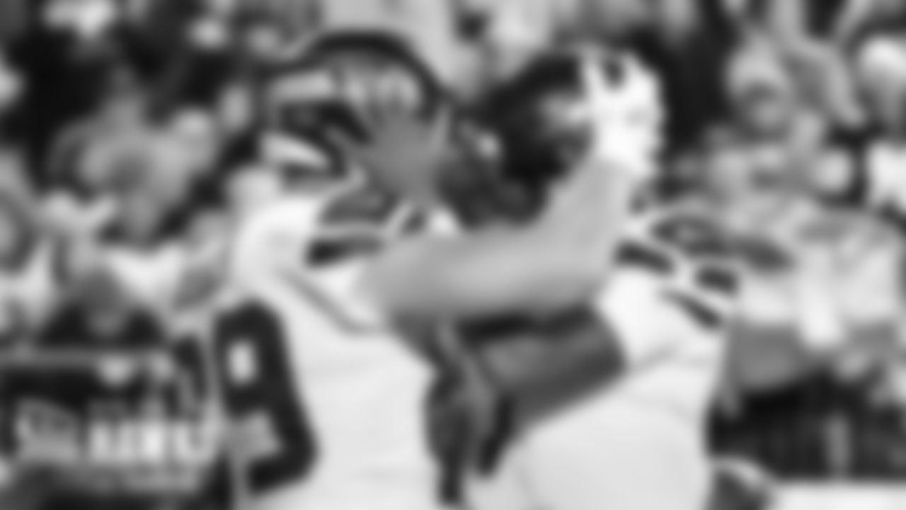 Seahawks tight end Will Dissly and quarterback Geno Smith celebrate after connecting on a touchdown pass in the third quarter.