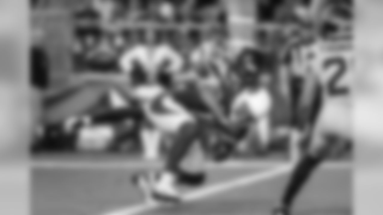 Cornerback Justin Coleman makes a pass defense knocking the ball away from Arizona's Larry Fitzgerald at the goal line.