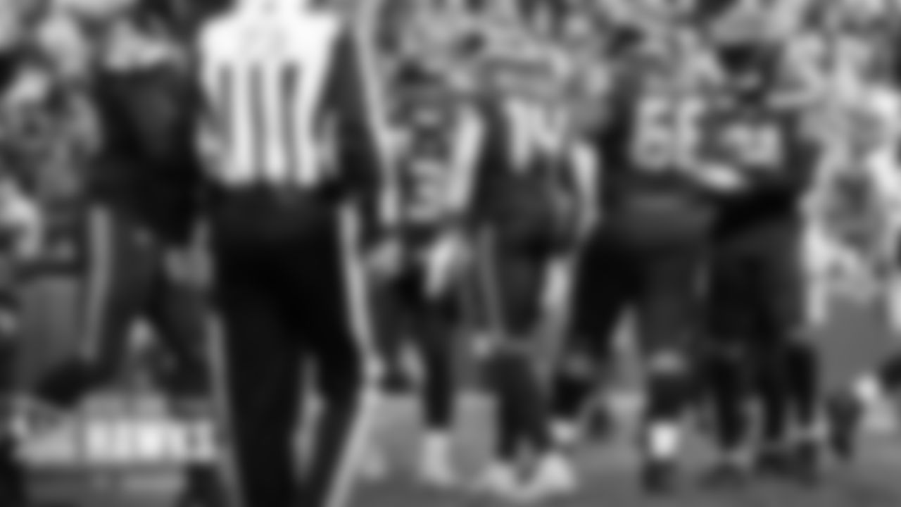Seahawks quarterback Russell Wilson lets out a yell after connecting with DK Metcalf for their third touchdown pass.