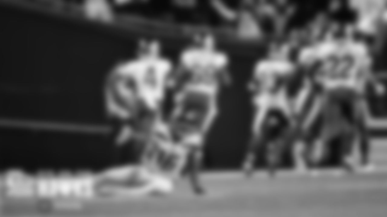 Seahawks receiver Tyler Lockett gets up after an interception by the Rams late in the game.