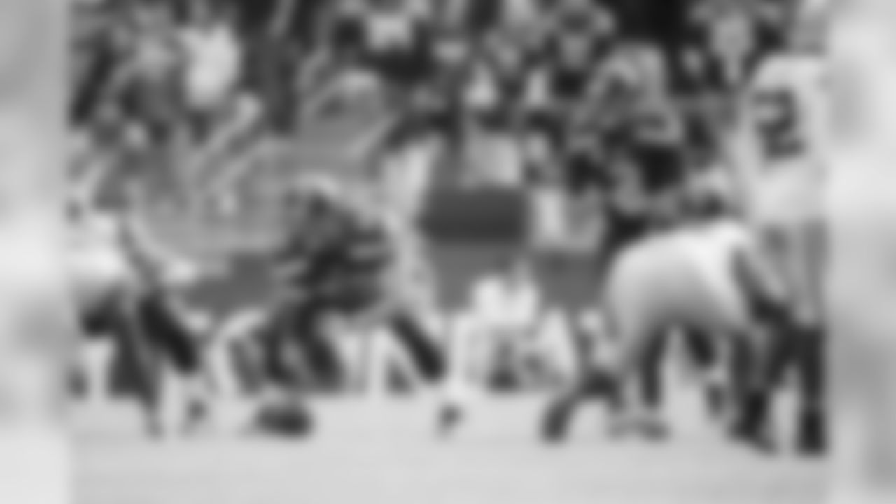 [September 9, 1990]: Bears 17 - Seahawks 0 Seattle Seahawks quarterback Dave Krieg (17) falls to the ground after being sacked for a 9-yard loss by Chicago Bears defensemen Trace Armstrong, left, and Dan Hampton, on ground right, in the second quarter in Chicago, Sept. 9, 1990. (AP Photo)