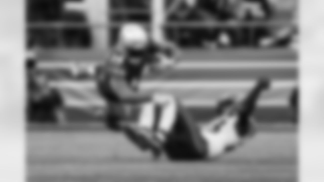 Seahawks receiver DK Metcalf dives ahead for yards after the catch.