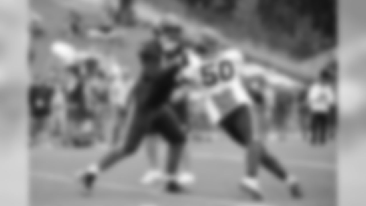 G Willie Beavers, left, and LB K.J. Wright, right