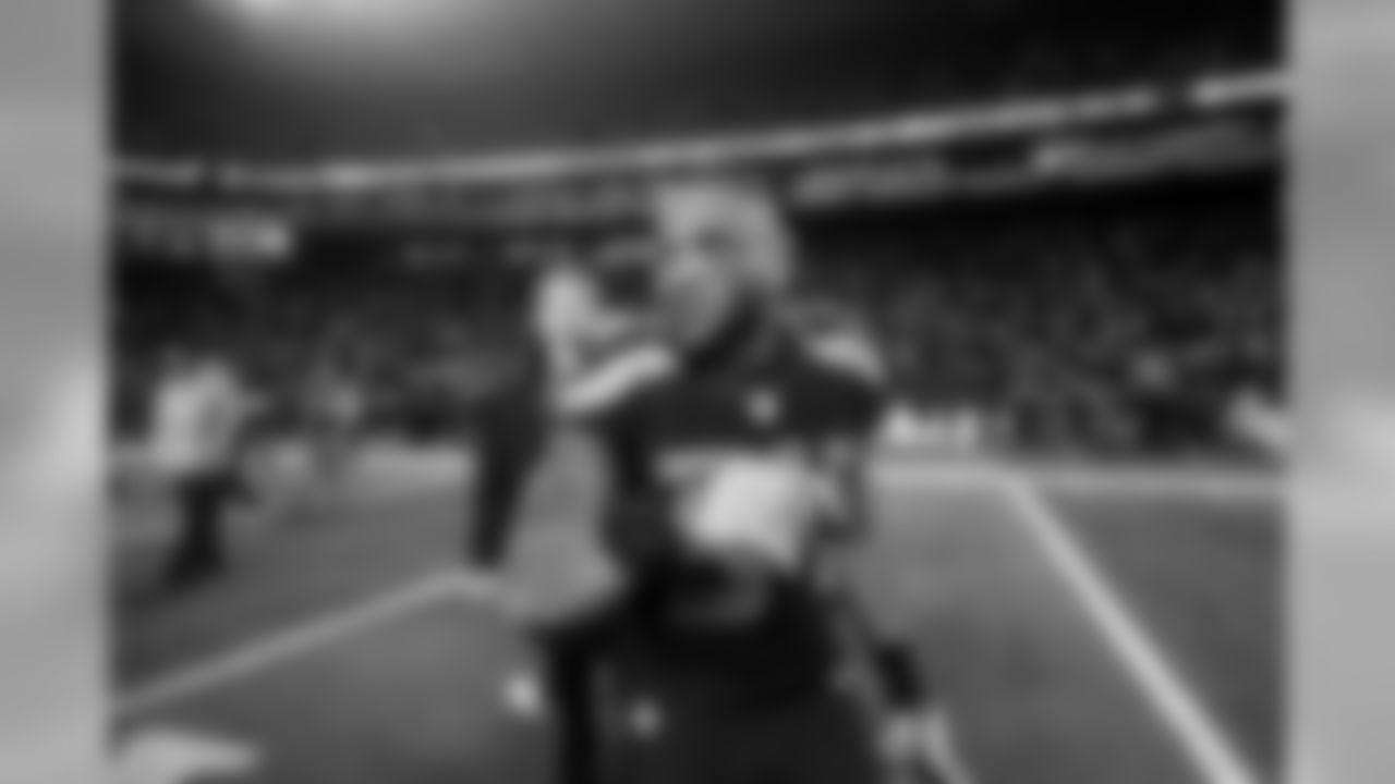 Running back Thomas Rawls, who finished the night with 161 yards and a touchdown on 27 carries, walks onto the field after the final whistle.