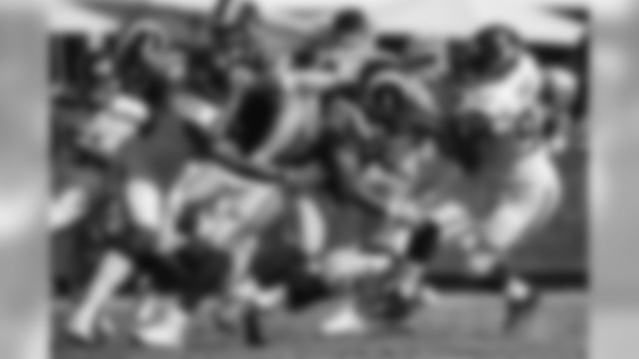 Seattle's Frank Clark collars Rams running back Todd Gurley.