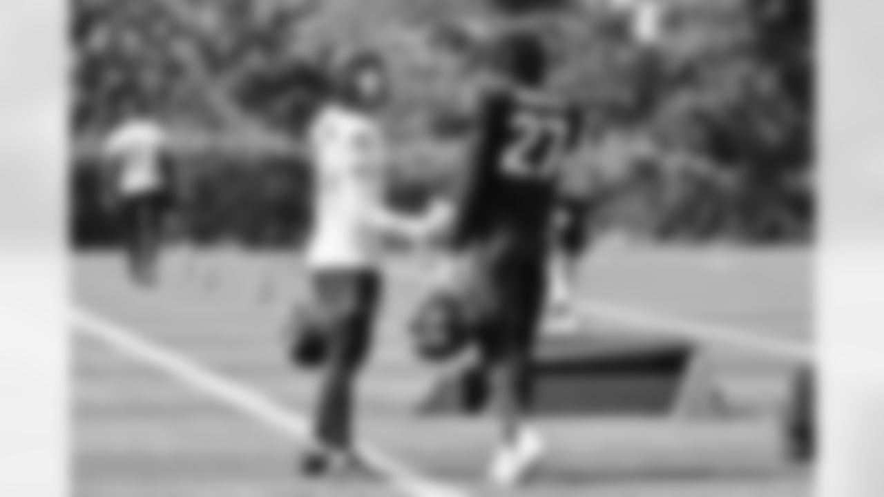 Seahawks wide receiver Jaxon Smith-Njigba (11) and cornerback Riq Woolen (27) at practice at the Virginia Mason Athletic Center in Renton, Wash. on Sept. 13, 2023.