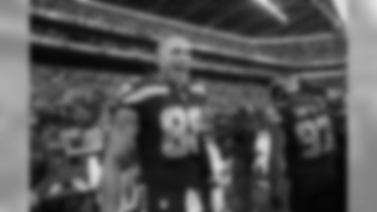 Jimmy Graham is all smiles on the Seahawks sideline after his two touchdown catches in the final six minutes help lift his team to the win.