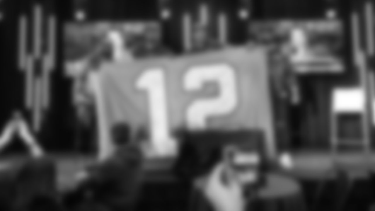 On Friday evening, Seahawks first round draft pick Charles Cross appears with Walter Jones at a draft party for 12s and assorted influencers.