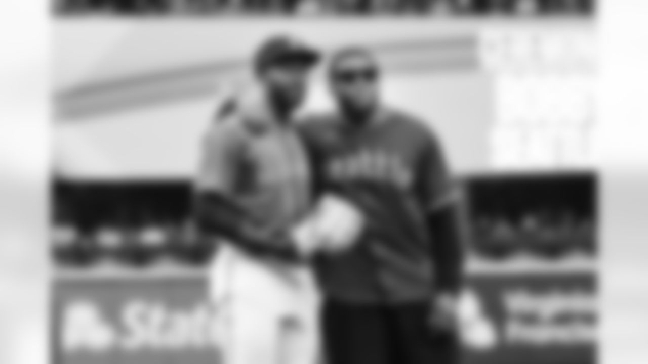 Seahawks linebacker Bobby Wagner throws out the ceremonial first pitch at a Seattle Mariners game on May 6, 2023 at T-Mobile Park.